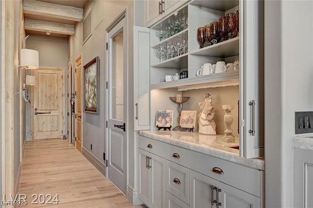 30 Via Tiberius Way, Henderson, NV 89011 - corridor featuring light wood finished floors and beamed ceiling