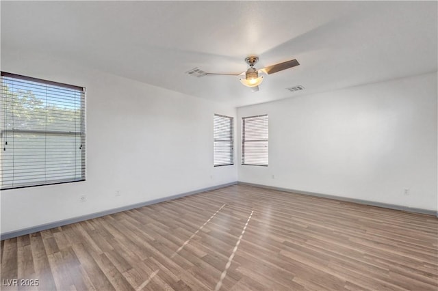 1069 Aspen Cliff Dr, Henderson, NV 89011 - empty room with wood finished floors and ceiling fan
