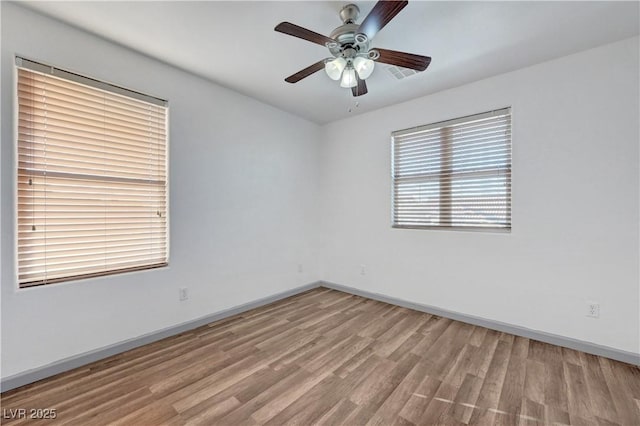 1069 Aspen Cliff Dr, Henderson, NV 89011 - unfurnished room featuring wood finished floors and ceiling fan