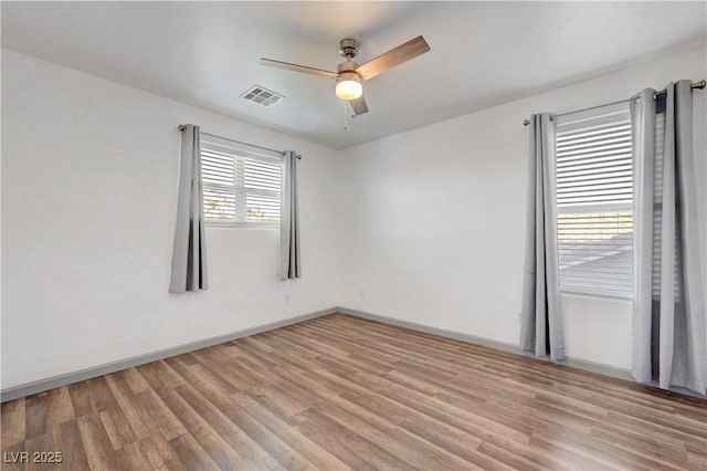 1069 Aspen Cliff Dr, Henderson, NV 89011 - unfurnished room featuring a ceiling fan and light wood-style flooring