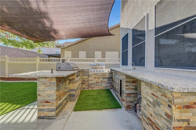 1069 Aspen Cliff Dr, Henderson, NV 89011 - view of patio / terrace featuring area for grilling and a sink