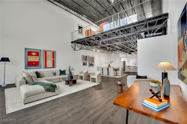 5015 Thunder River Cir, Las Vegas, NV 89148 - living area featuring a towering ceiling and wood finished floors