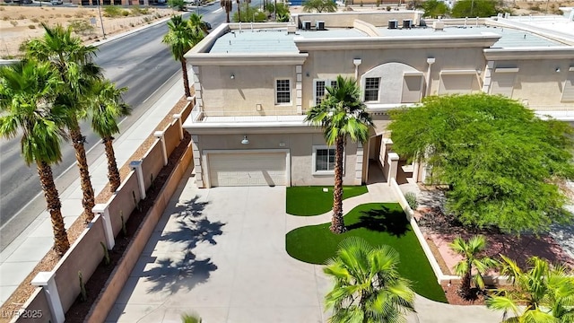 5015 Thunder River Cir, Las Vegas, NV 89148 - view of front of house with stucco siding, concrete driveway, and a garage
