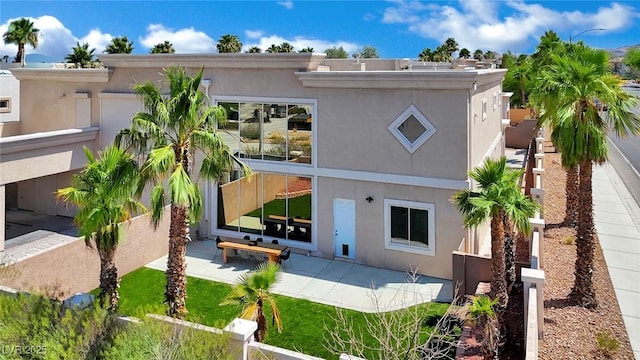 5015 Thunder River Cir, Las Vegas, NV 89148 - back of property with a patio and stucco siding
