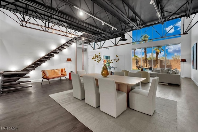 5015 Thunder River Cir, Las Vegas, NV 89148 - dining space featuring a high ceiling and wood finished floors