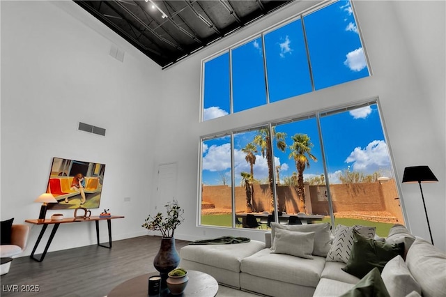 5015 Thunder River Cir, Las Vegas, NV 89148 - living area with a high ceiling and wood finished floors