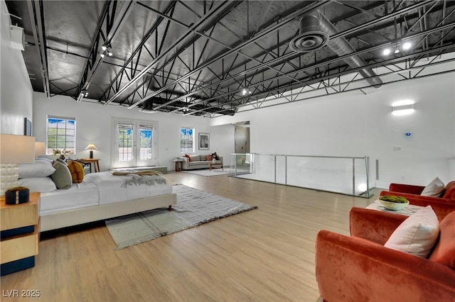 5015 Thunder River Cir, Las Vegas, NV 89148 - living room featuring wood finished floors and a high ceiling