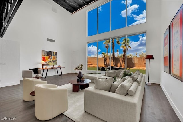 5015 Thunder River Cir, Las Vegas, NV 89148 - living room with wood finished floors and a towering ceiling