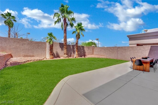5015 Thunder River Cir, Las Vegas, NV 89148 - fenced backyard with a patio area