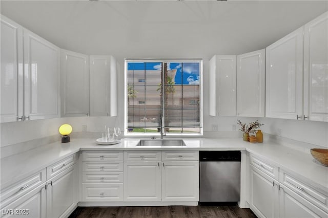 5015 Thunder River Cir, Las Vegas, NV 89148 - kitchen with dishwasher, white cabinetry, dark wood finished floors, and light countertops