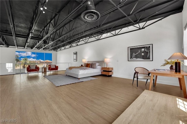 5015 Thunder River Cir, Las Vegas, NV 89148 - bedroom featuring wood finished floors and baseboards