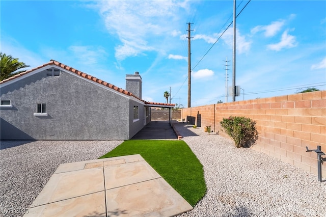 5417 Bible Cir, North Las Vegas, NV 89031 - fenced backyard featuring a patio