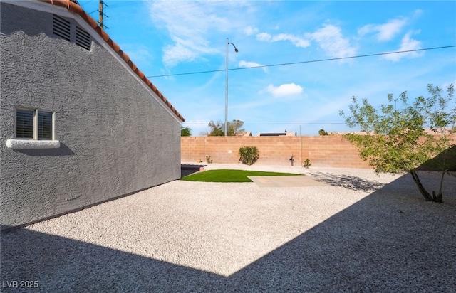 5417 Bible Cir, North Las Vegas, NV 89031 - fenced yard featuring a patio