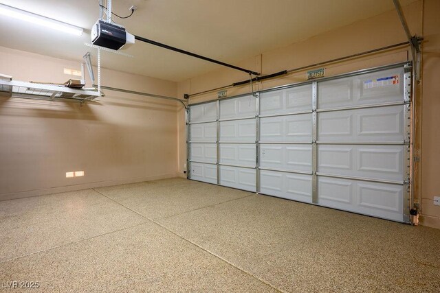 10513 Shanna Trellis Ave, Las Vegas, NV 89144 - garage with a garage door opener and baseboards