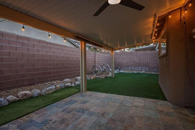 10513 Shanna Trellis Ave, Las Vegas, NV 89144 - fenced backyard featuring ceiling fan and a patio area