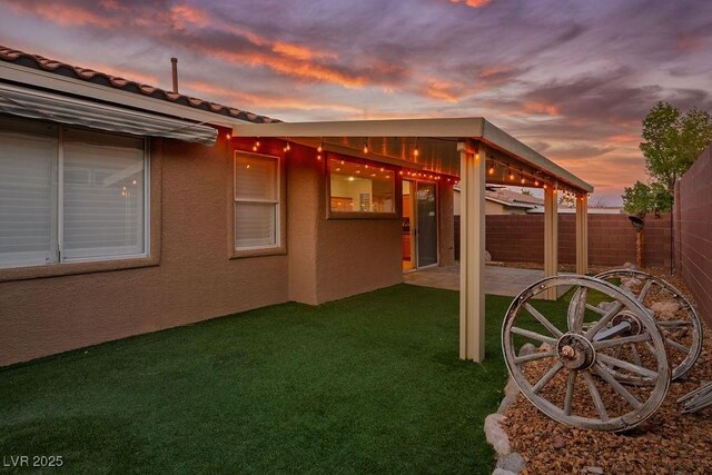 10513 Shanna Trellis Ave, Las Vegas, NV 89144 - fenced backyard featuring a patio