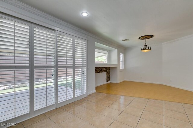 10513 Shanna Trellis Ave, Las Vegas, NV 89144 - unfurnished room featuring ornamental molding, light tile patterned floors, and recessed lighting