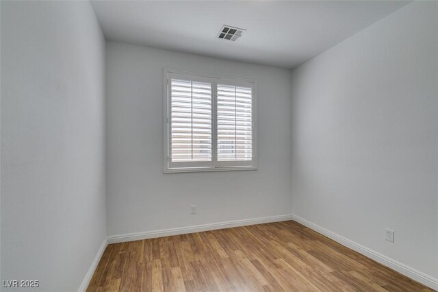 10513 Shanna Trellis Ave, Las Vegas, NV 89144 - empty room with light wood-style flooring and baseboards