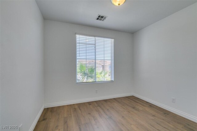 10513 Shanna Trellis Ave, Las Vegas, NV 89144 - spare room with wood finished floors and baseboards