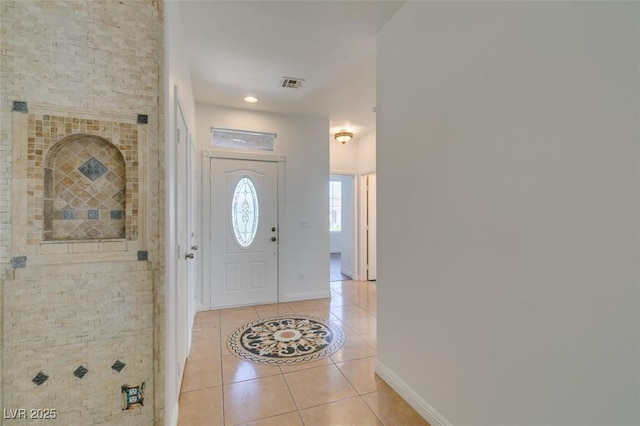 10513 Shanna Trellis Ave, Las Vegas, NV 89144 - entryway featuring light tile patterned floors and baseboards