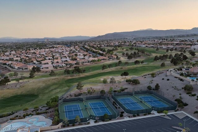 10513 Shanna Trellis Ave, Las Vegas, NV 89144 - aerial view of a local golf course and a mountain backdrop