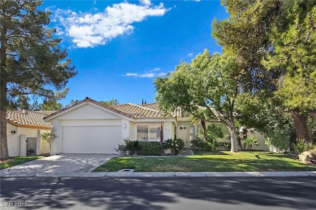 8981 Rivers Edge Dr, Las Vegas, NV 89117 - view of front of property with stucco siding, a garage, a tile roof, concrete driveway, and a front yard