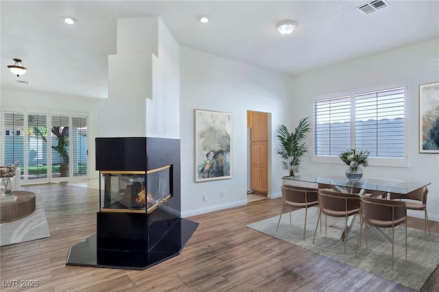 8981 Rivers Edge Dr, Las Vegas, NV 89117 - dining room with light wood-type flooring and recessed lighting