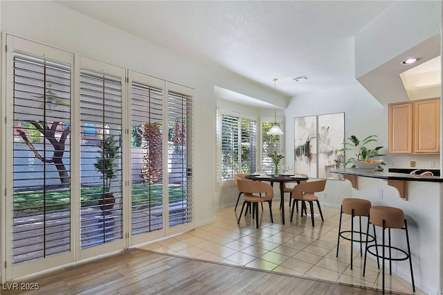 8981 Rivers Edge Dr, Las Vegas, NV 89117 - dining area with light wood-type flooring and baseboards
