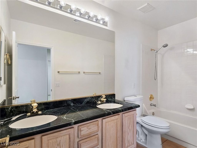 8981 Rivers Edge Dr, Las Vegas, NV 89117 - bathroom featuring double vanity, shower / bath combination, and tile patterned flooring