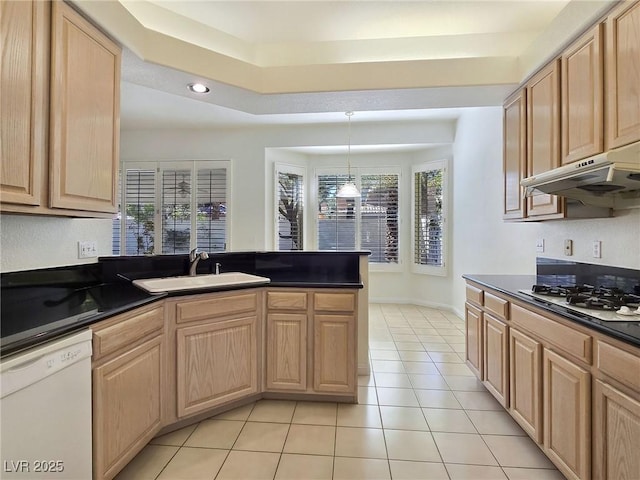 8981 Rivers Edge Dr, Las Vegas, NV 89117 - kitchen with white appliances, dark countertops, a peninsula, under cabinet range hood, and recessed lighting