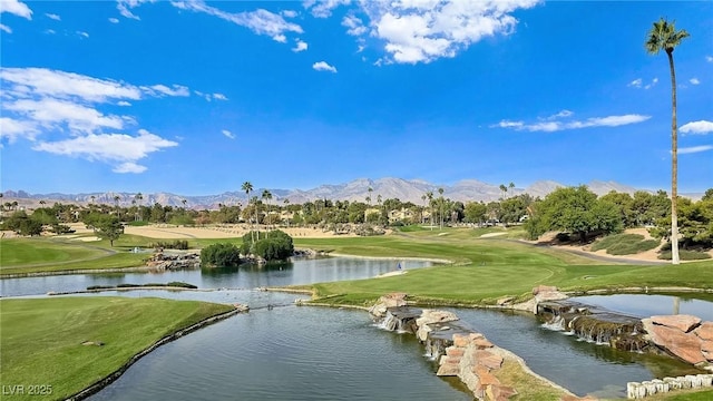 8981 Rivers Edge Dr, Las Vegas, NV 89117 - surrounding community featuring a water and mountain view, view of golf course, and a yard