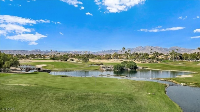 8981 Rivers Edge Dr, Las Vegas, NV 89117 - surrounding community featuring view of golf course, a water and mountain view, and a yard