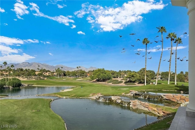 8981 Rivers Edge Dr, Las Vegas, NV 89117 - view of property's community featuring a lawn, golf course view, and a water and mountain view