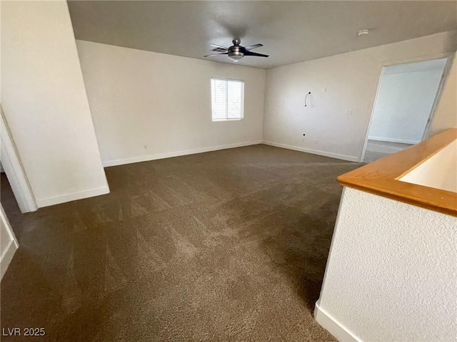 4126 Jessica Marie St, North Las Vegas, NV 89032 - unfurnished room featuring ceiling fan and dark carpet