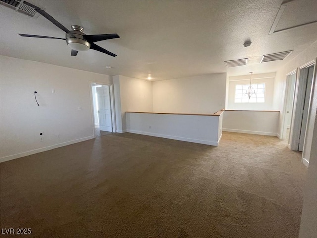 4126 Jessica Marie St, North Las Vegas, NV 89032 - carpeted spare room with a ceiling fan and a chandelier