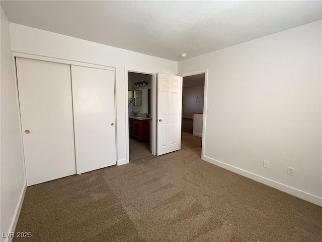 4126 Jessica Marie St, North Las Vegas, NV 89032 - unfurnished bedroom featuring carpet floors, a closet, and ensuite bathroom