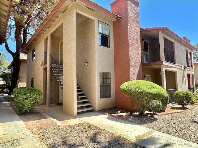 5576 W Rochelle Ave Unit 27A, Las Vegas, NV 89103 - view of property featuring stairs