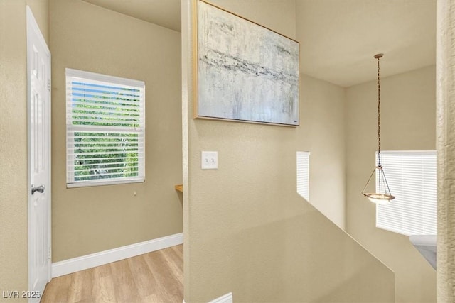 9975 Peace Way Unit 2009, Las Vegas, NV 89147 - hall featuring wood finished floors and baseboards