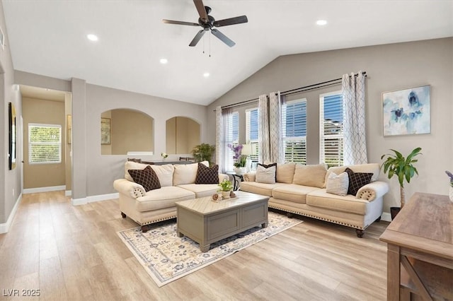 9975 Peace Way Unit 2009, Las Vegas, NV 89147 - living room featuring a ceiling fan, light wood finished floors, vaulted ceiling, and recessed lighting
