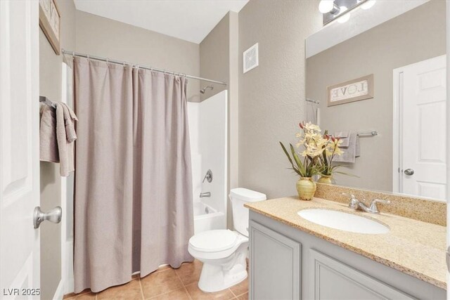 9975 Peace Way Unit 2009, Las Vegas, NV 89147 - full bath with vanity, tile patterned flooring, and shower / bath combination with curtain