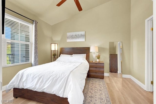9975 Peace Way Unit 2009, Las Vegas, NV 89147 - bedroom featuring wood finished floors, ceiling fan, and high vaulted ceiling