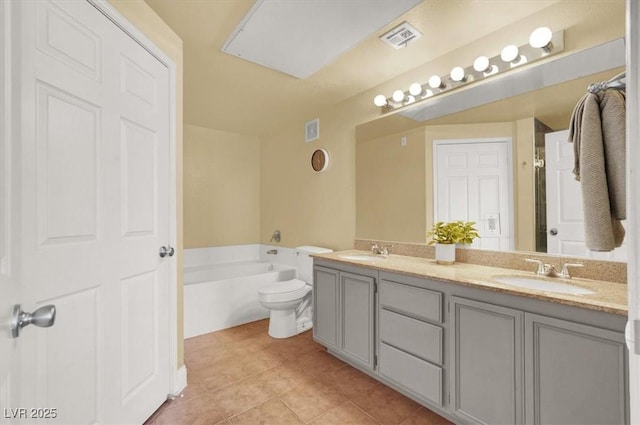 9975 Peace Way Unit 2009, Las Vegas, NV 89147 - bathroom with double vanity, tile patterned floors, and a bath