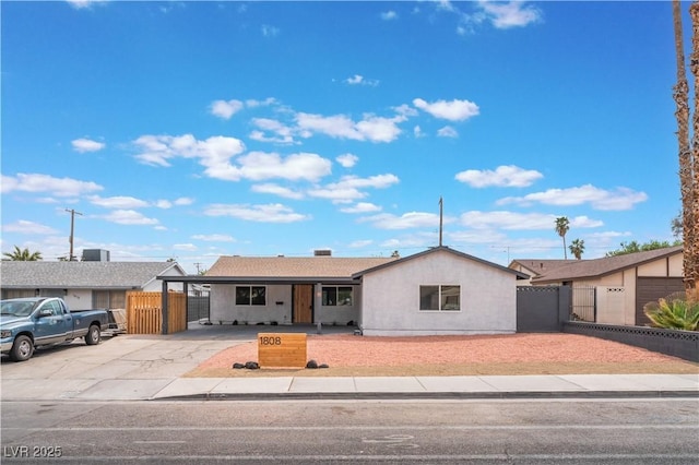 1808 E Saint Louis Ave, Las Vegas, NV 89104 - ranch-style home with driveway, an attached carport, and a gate