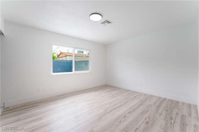 1808 E Saint Louis Ave, Las Vegas, NV 89104 - unfurnished room with wood finished floors and baseboards