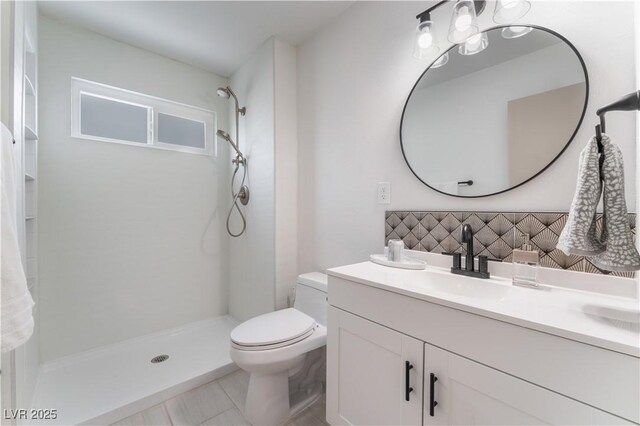 1808 E Saint Louis Ave, Las Vegas, NV 89104 - full bath with vanity, tasteful backsplash, and a shower