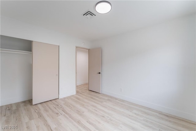 1808 E Saint Louis Ave, Las Vegas, NV 89104 - unfurnished bedroom with a closet and wood finished floors