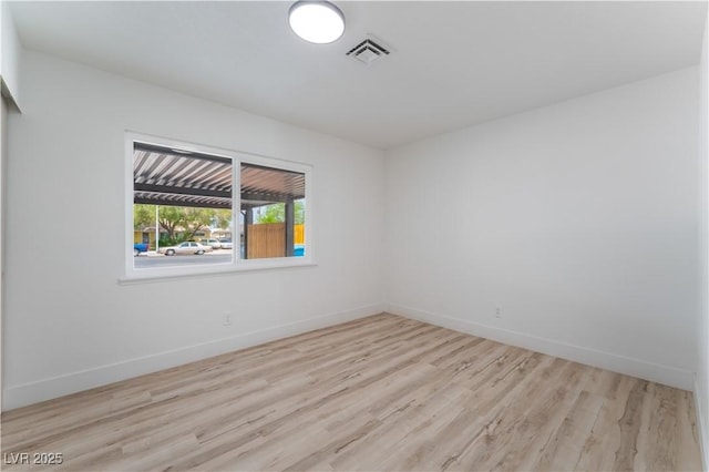 1808 E Saint Louis Ave, Las Vegas, NV 89104 - spare room with wood finished floors and baseboards