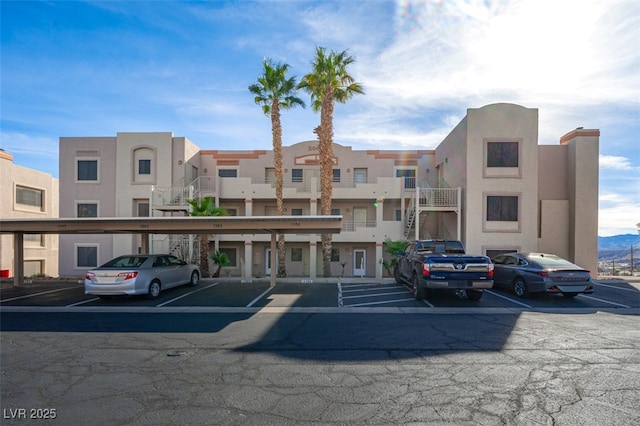 2068 Mesquite Ln Unit 203, Laughlin, NV 89029 - view of property with covered and uncovered parking