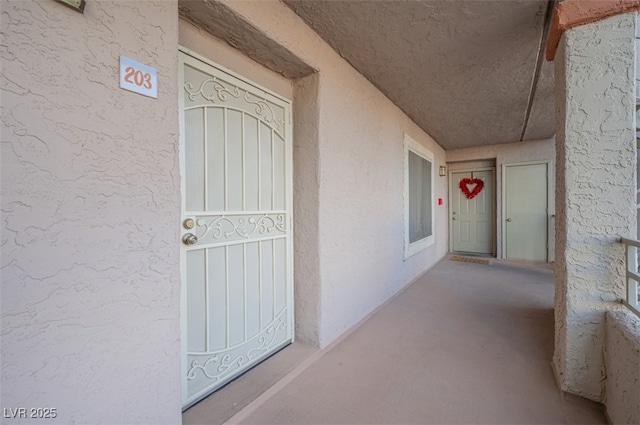 2068 Mesquite Ln Unit 203, Laughlin, NV 89029 - view of exterior entry with stucco siding