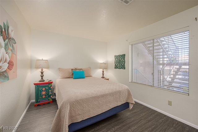 2068 Mesquite Ln Unit 203, Laughlin, NV 89029 - bedroom featuring wood finished floors and baseboards